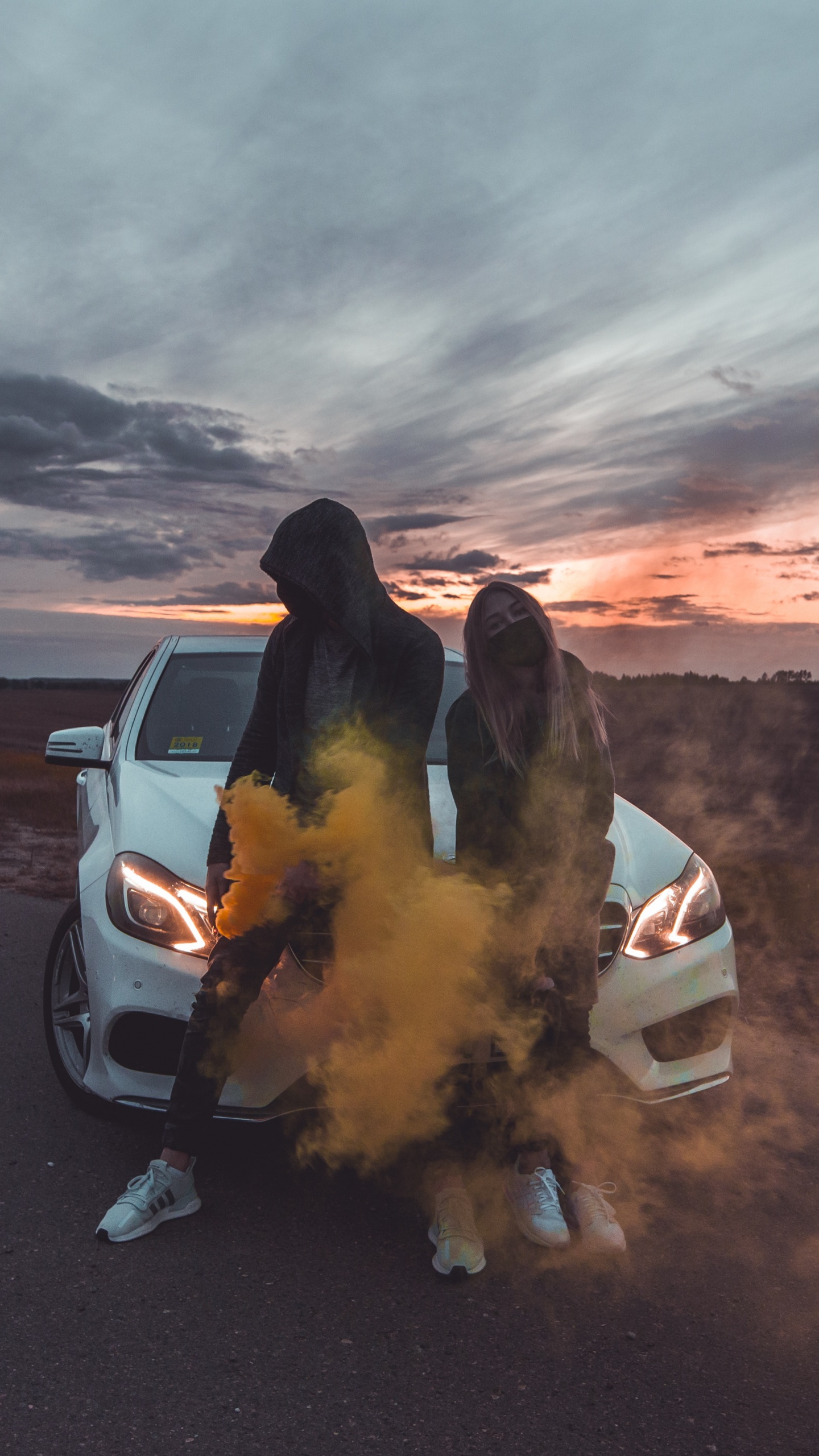White Car on Gray Sand During Sunset. Wallpaper in 1440x2560 Resolution