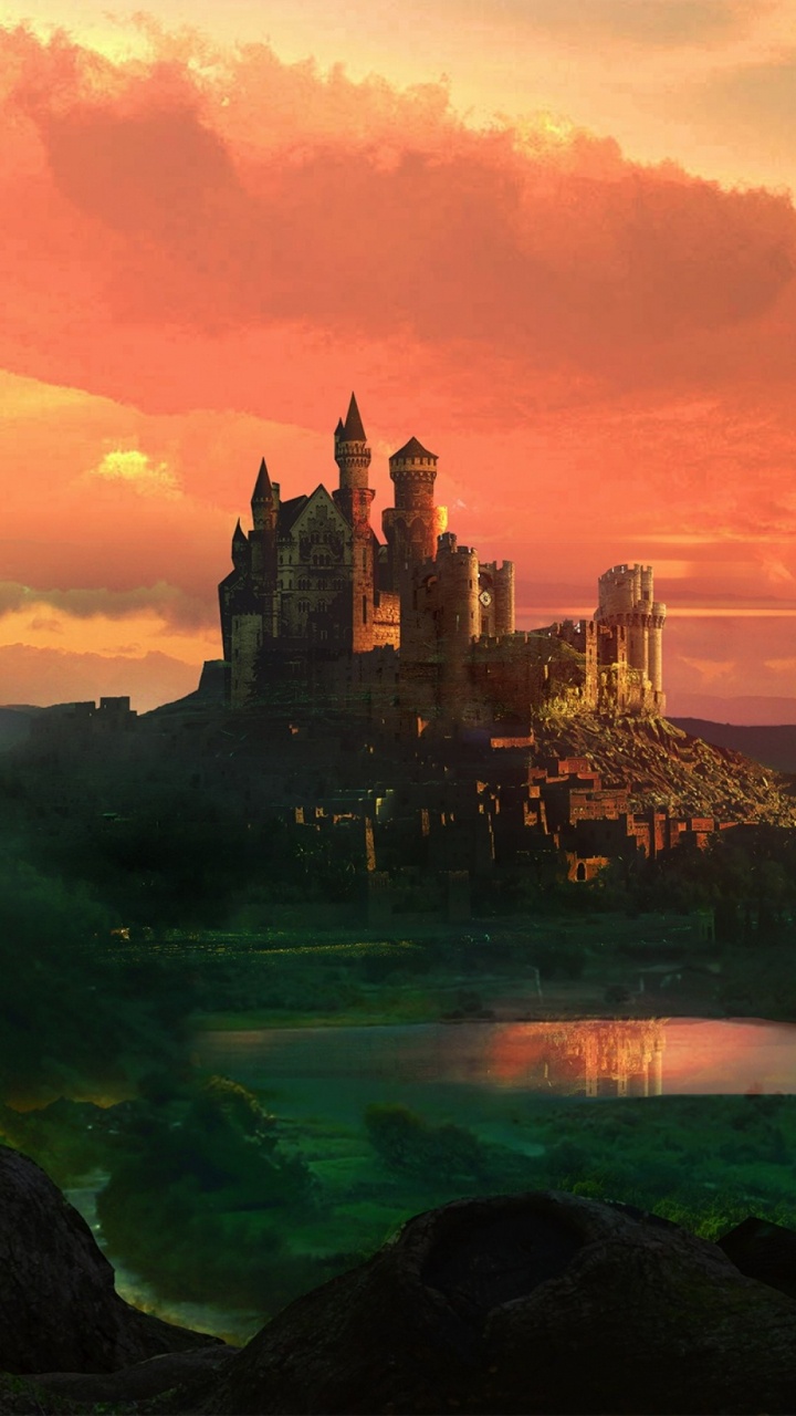 Silhouette of Woman Standing on Rock Formation Near Body of Water During Sunset. Wallpaper in 720x1280 Resolution