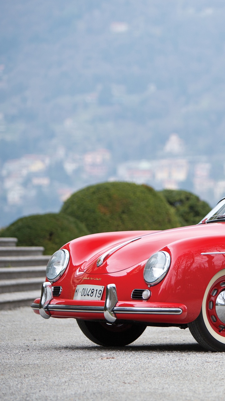 Red Convertible Car on Gray Concrete Road During Daytime. Wallpaper in 720x1280 Resolution