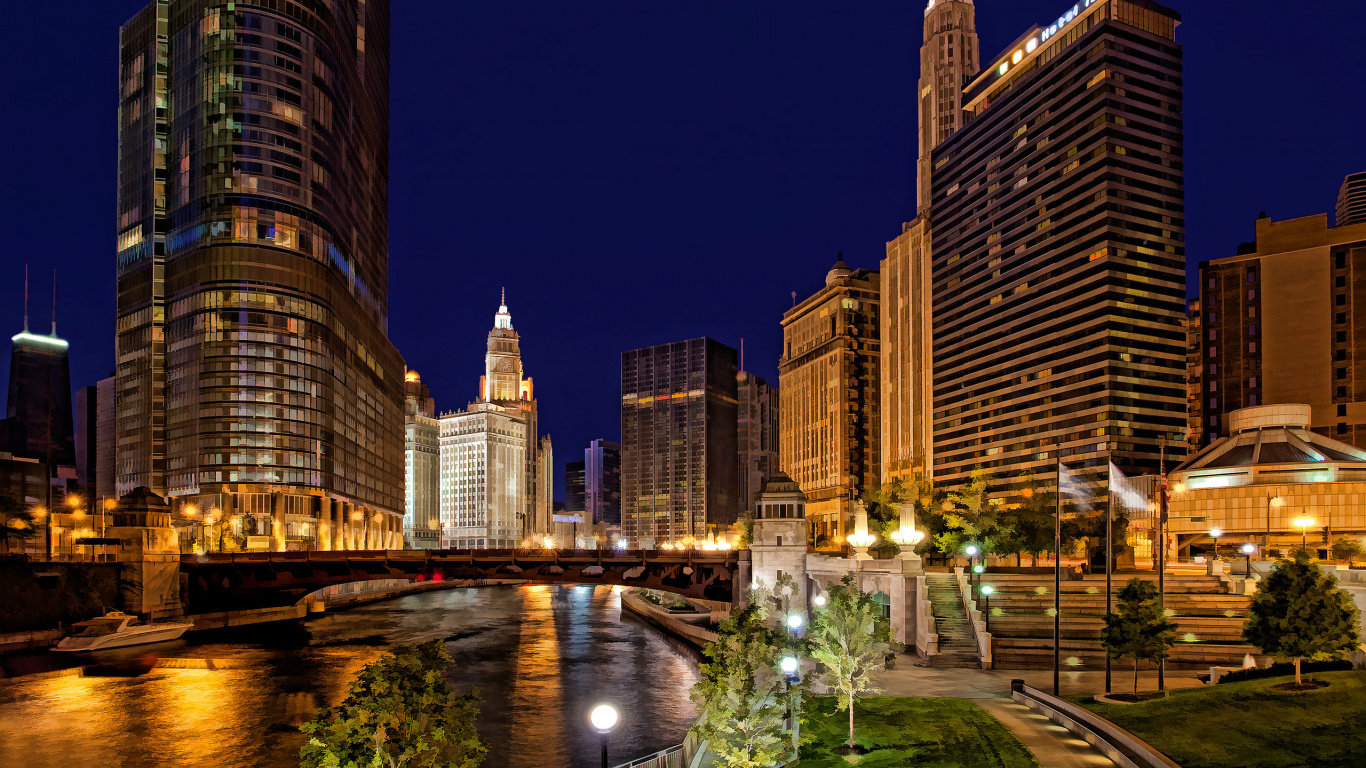 City Buildings With Lights Turned on During Night Time. Wallpaper in 1366x768 Resolution