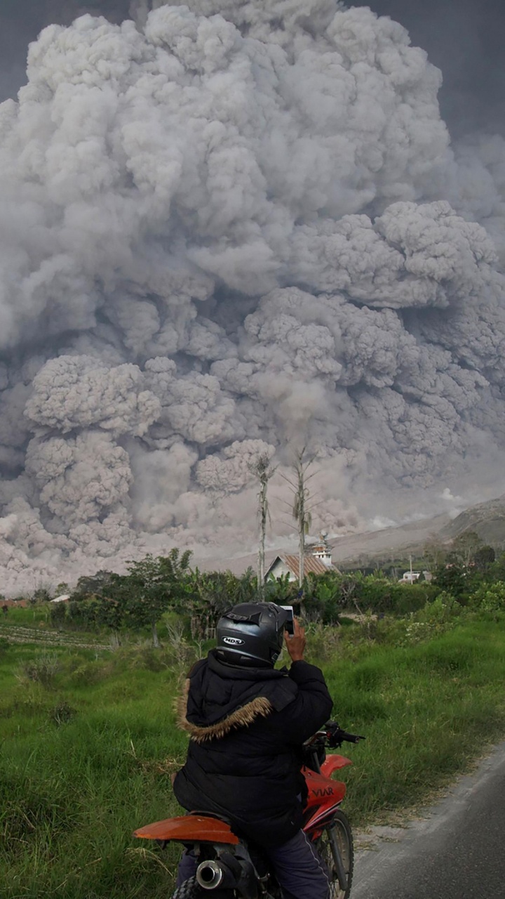 Man Riding Motorcycle on Road During Daytime. Wallpaper in 720x1280 Resolution