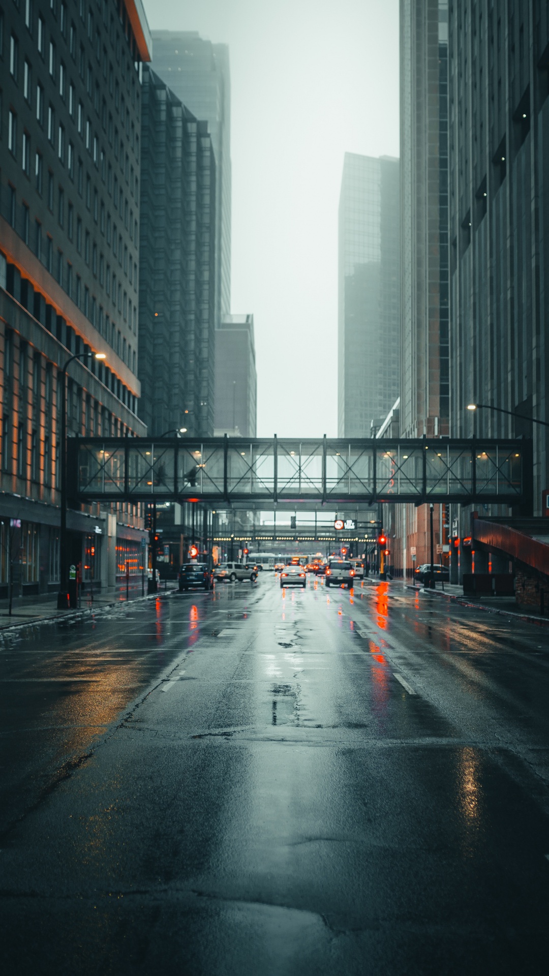 Cars on Road Between High Rise Buildings During Daytime. Wallpaper in 1080x1920 Resolution