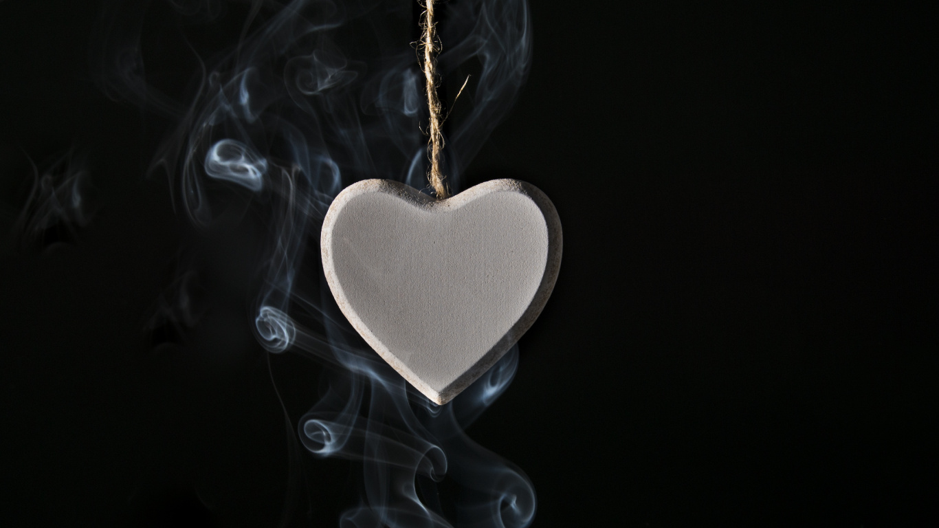 Silver Heart Shape Pendant With White Smoke. Wallpaper in 1366x768 Resolution