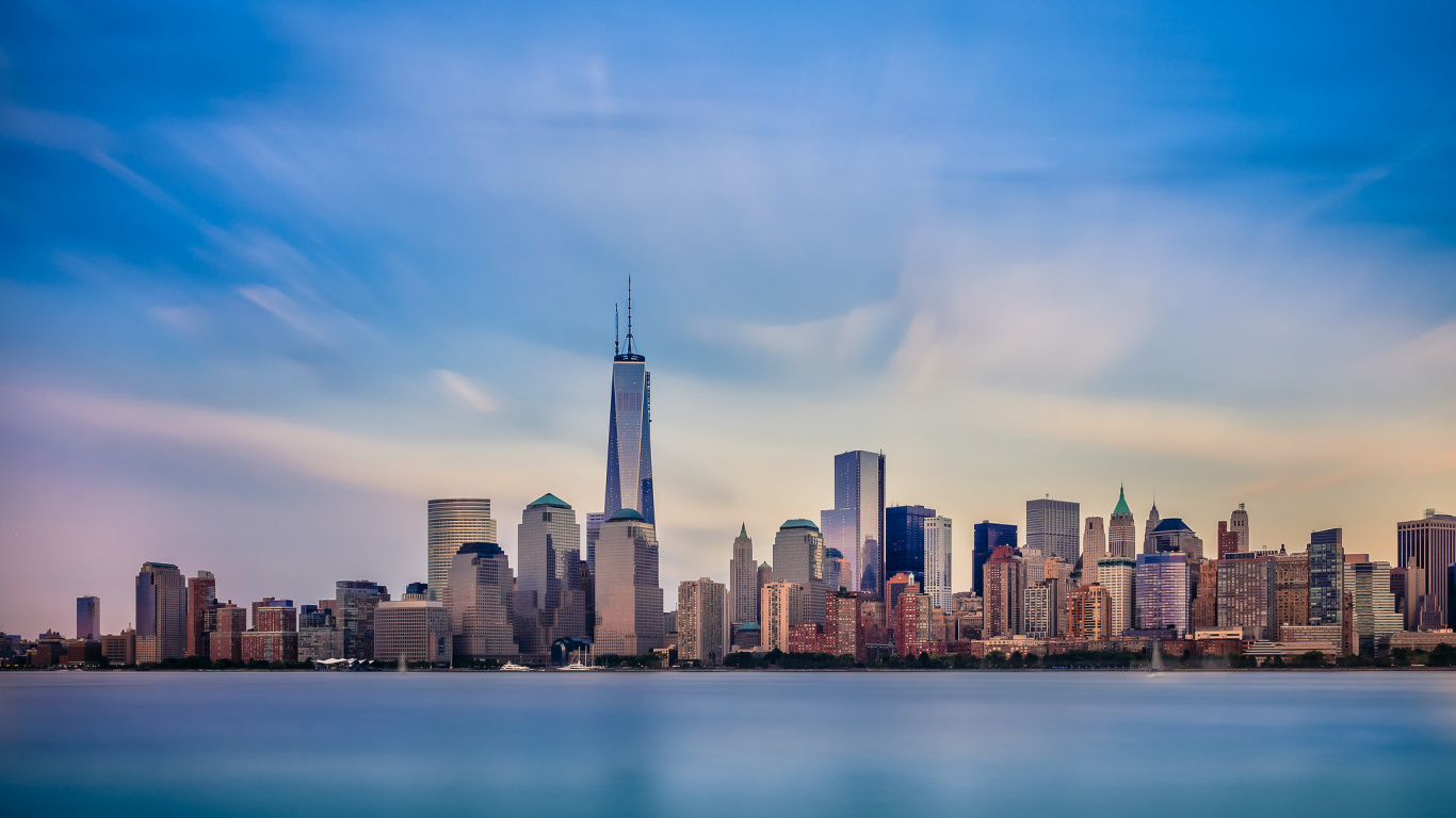City Skyline Under Blue Sky During Daytime. Wallpaper in 1366x768 Resolution