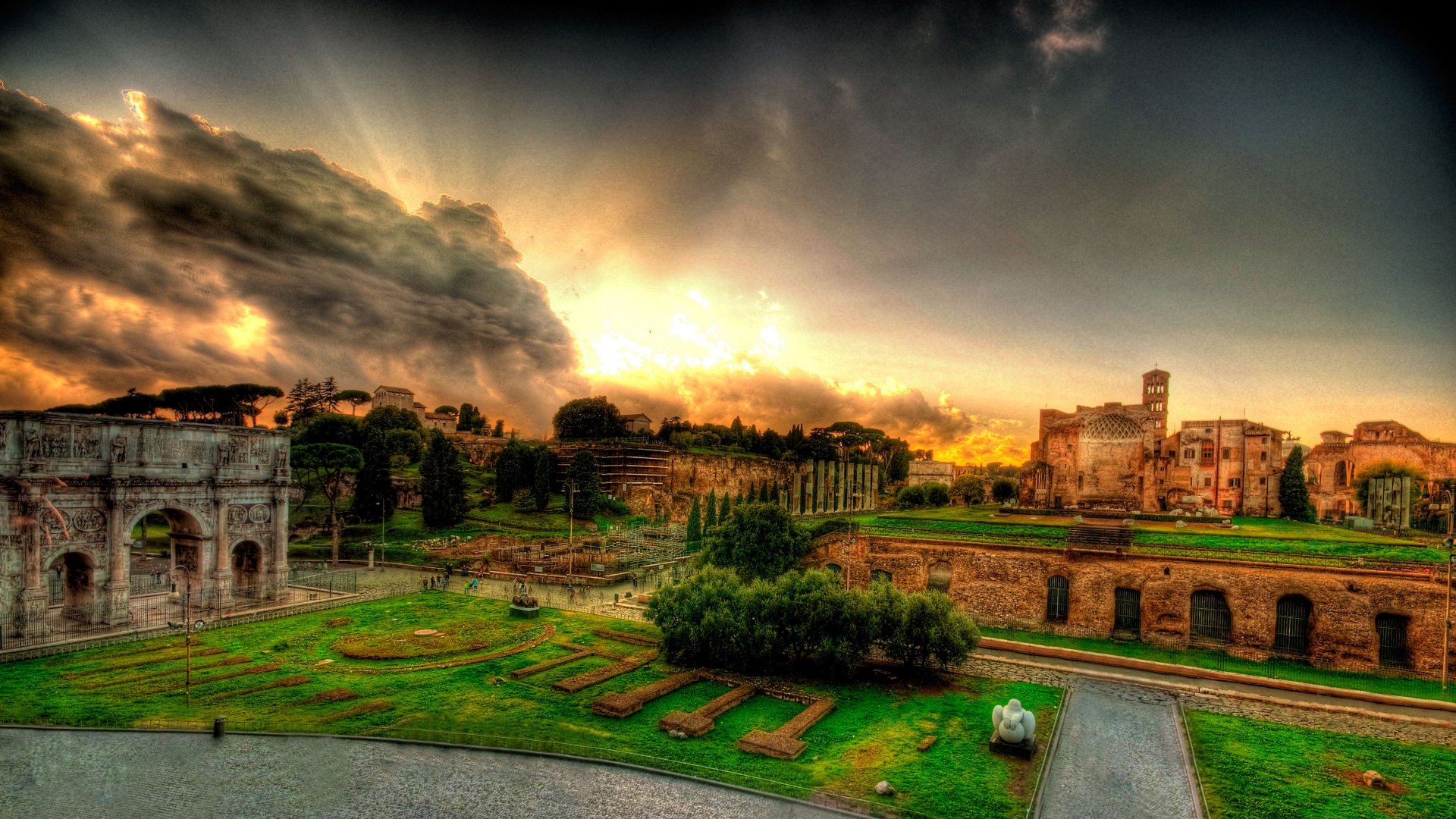 Green Grass Field Near Brown Building Under Cloudy Sky. Wallpaper in 1920x1080 Resolution