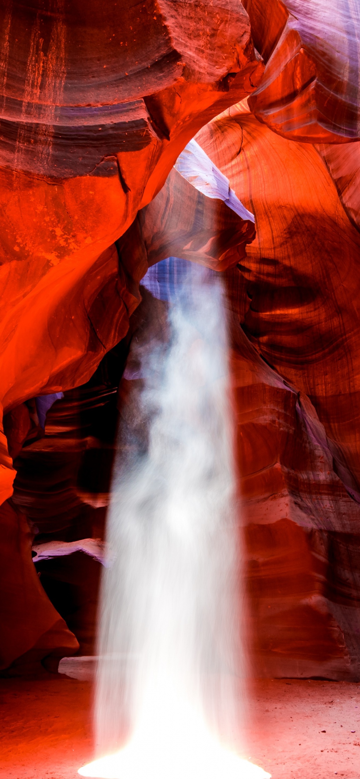 Brown Rock Formation With Water Falls. Wallpaper in 1242x2688 Resolution
