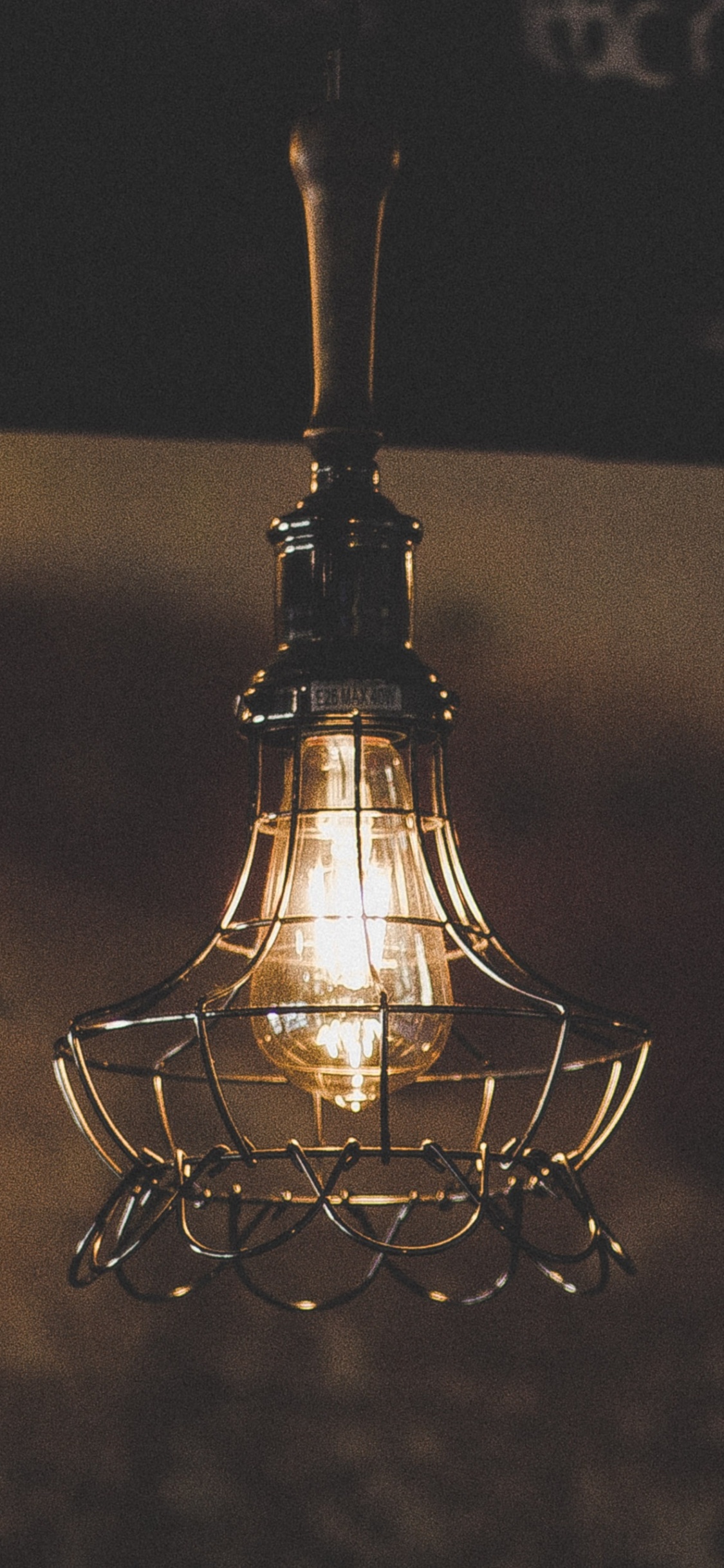 Black and Brown Pendant Lamp. Wallpaper in 1125x2436 Resolution