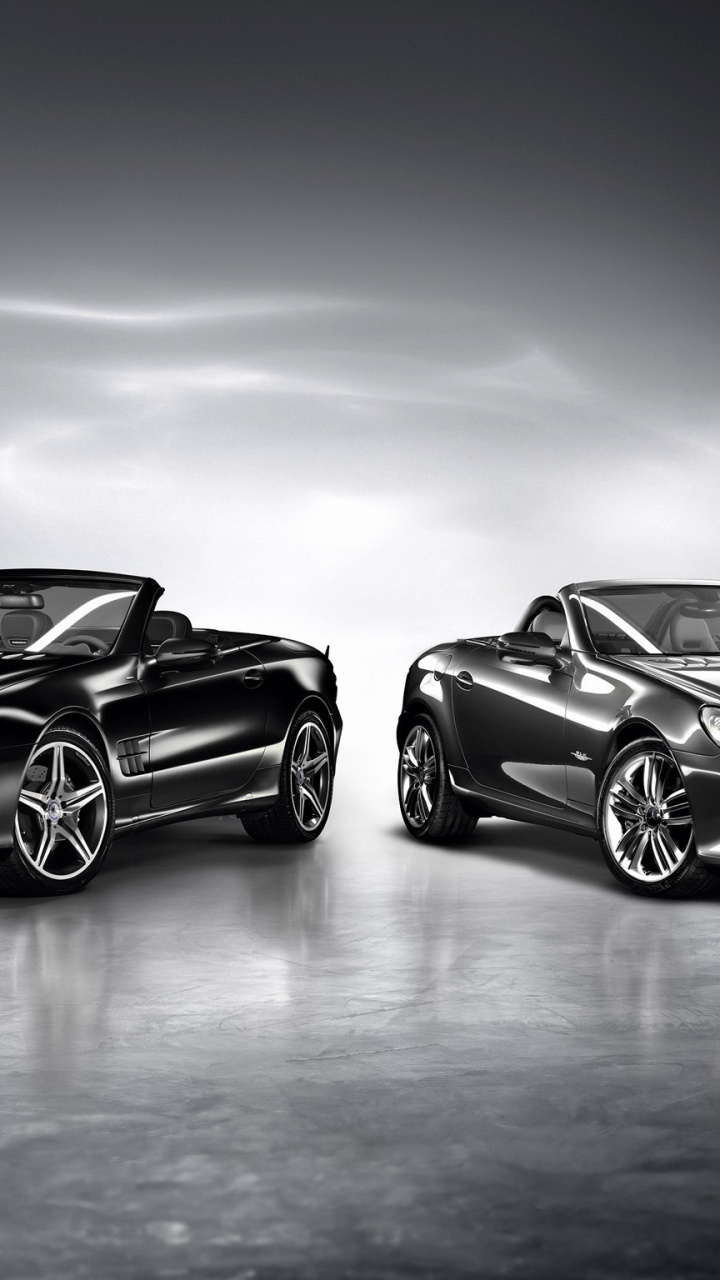 Schwarzer Porsche 911 Auf Graustufenfotografie. Wallpaper in 720x1280 Resolution