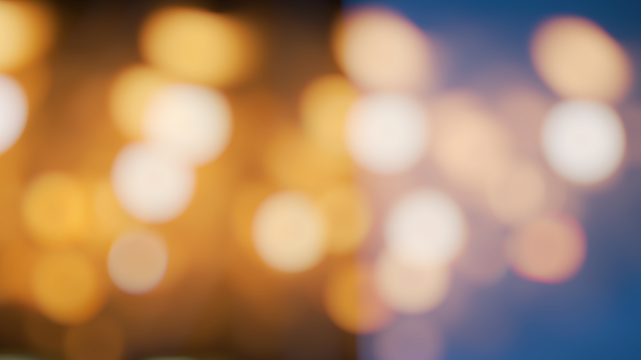 Gelbe Und Blaue Bokeh-Lichter. Wallpaper in 2560x1440 Resolution