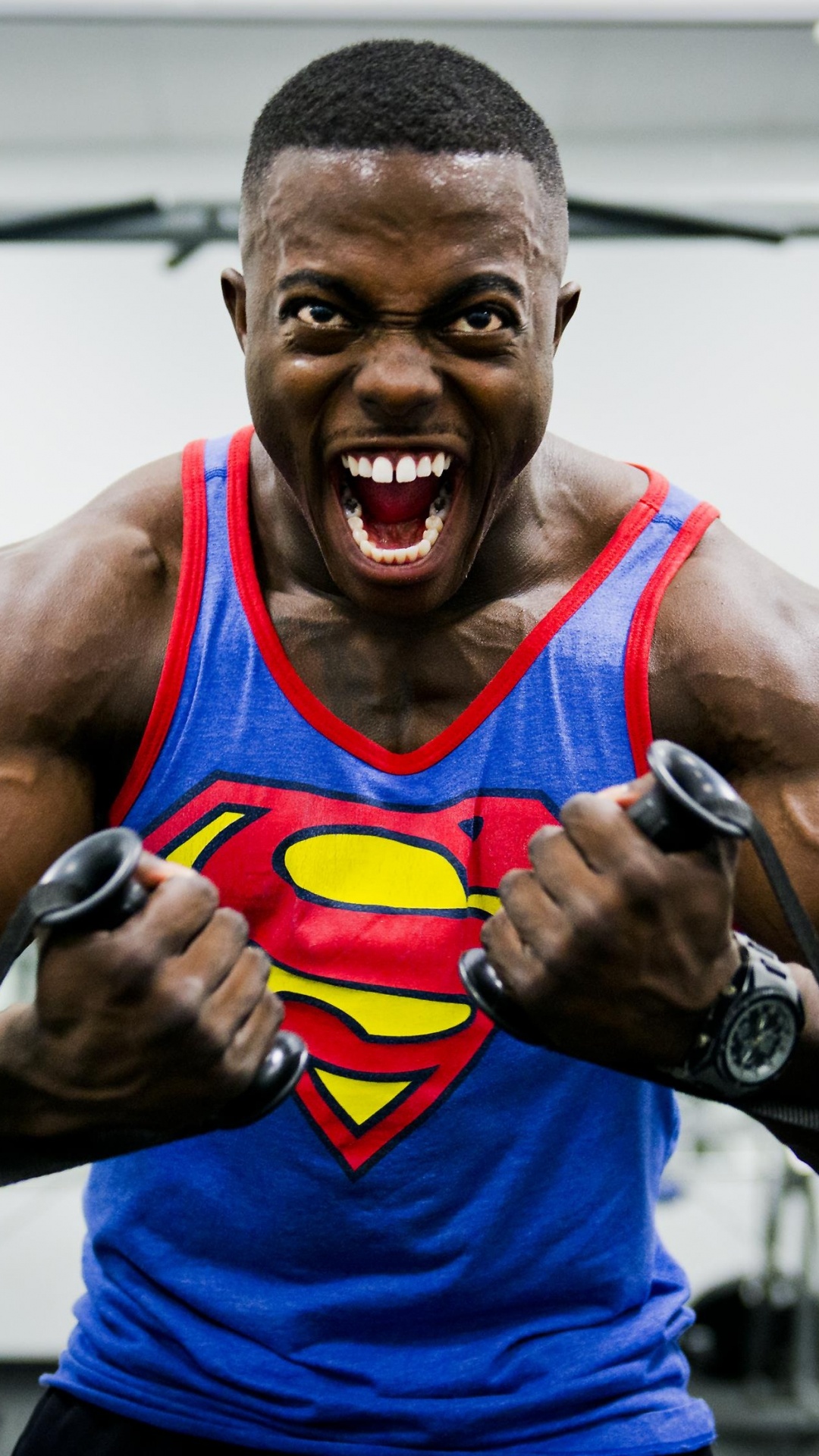 Man in Blue and Yellow Nike Tank Top. Wallpaper in 1080x1920 Resolution