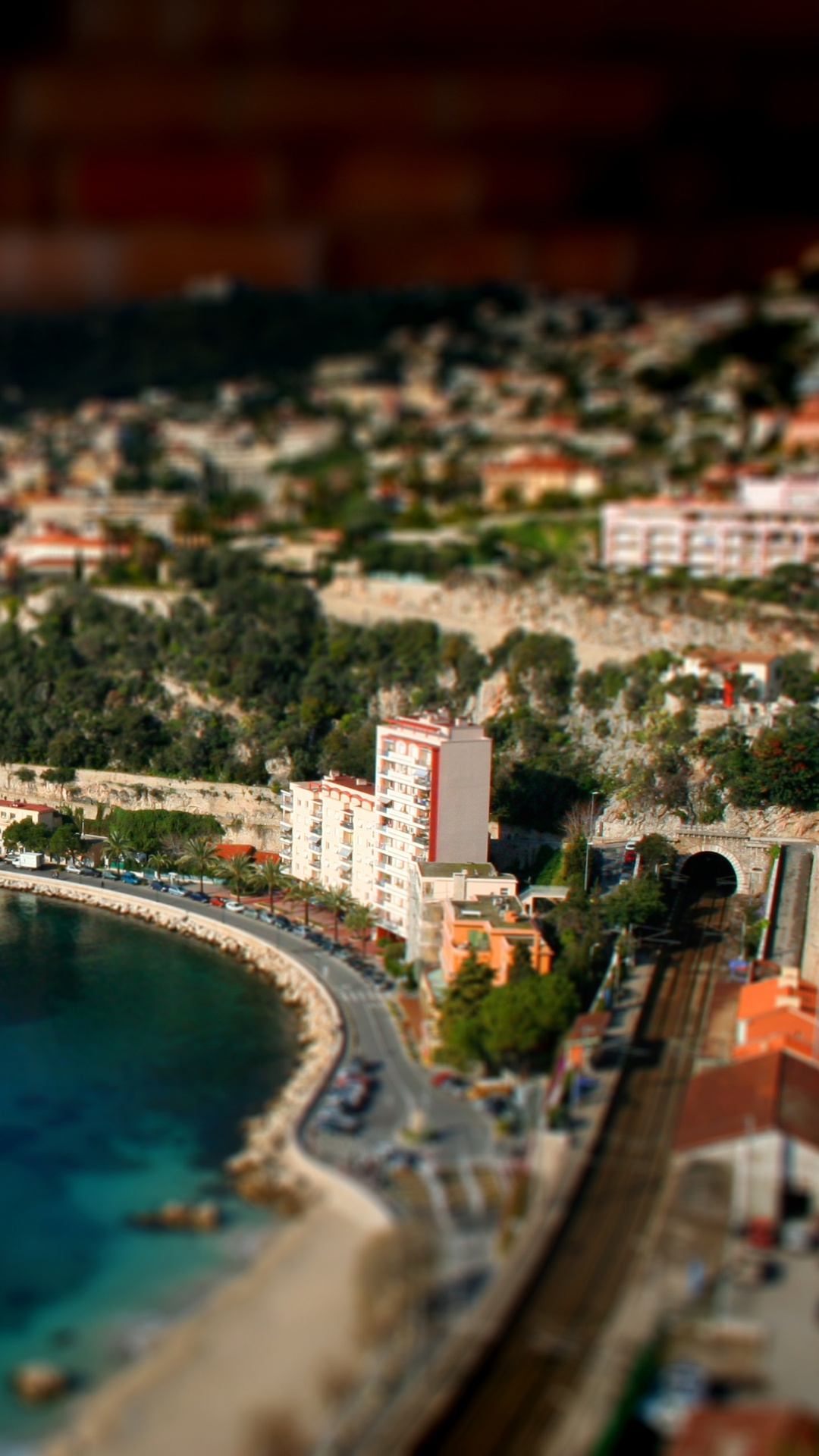 Aerial View of City Buildings Near Body of Water During Daytime. Wallpaper in 1080x1920 Resolution