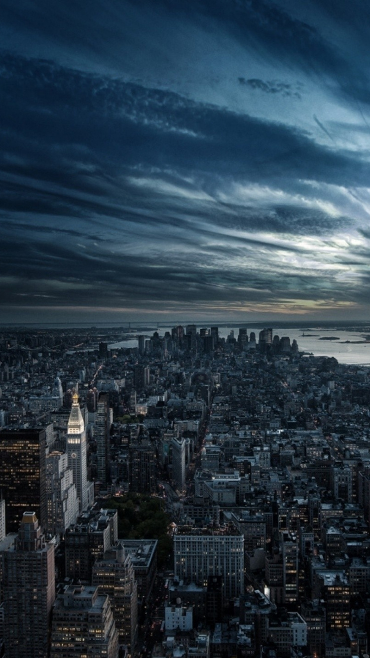 Aerial View of City Buildings During Night Time. Wallpaper in 750x1334 Resolution