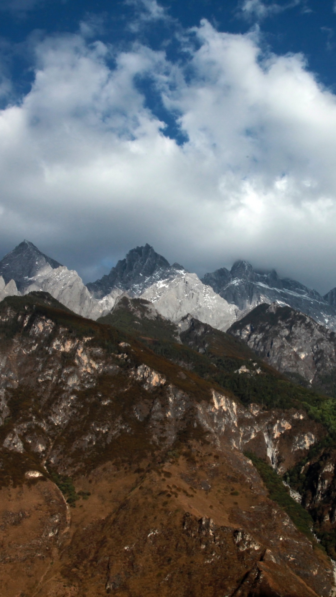 Brown and Green Mountains Under White Clouds and Blue Sky During Daytime. Wallpaper in 1080x1920 Resolution
