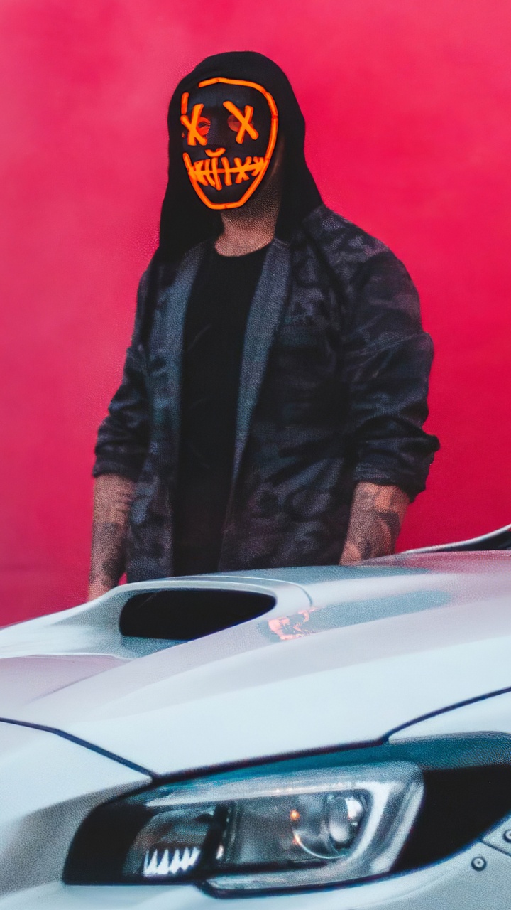 Man in Black Jacket Standing Beside White Car. Wallpaper in 720x1280 Resolution