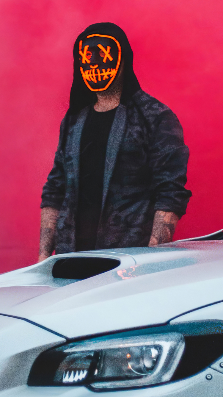 Man in Black Jacket Standing Beside White Car. Wallpaper in 750x1334 Resolution