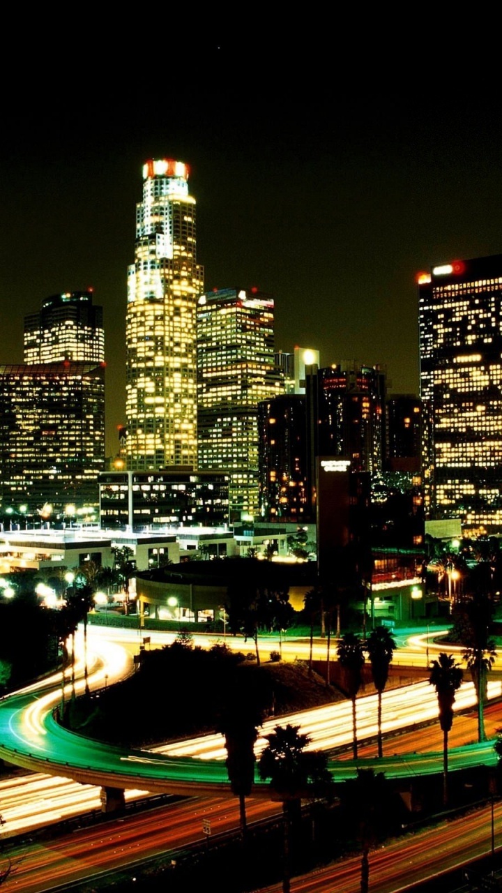City Buildings During Night Time. Wallpaper in 720x1280 Resolution
