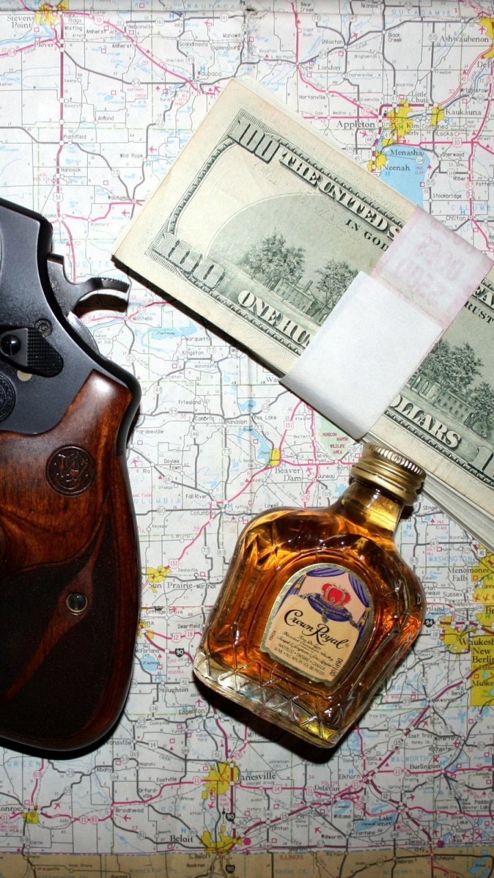 Pistola Revólver Negra y Marrón. Wallpaper in 720x1280 Resolution