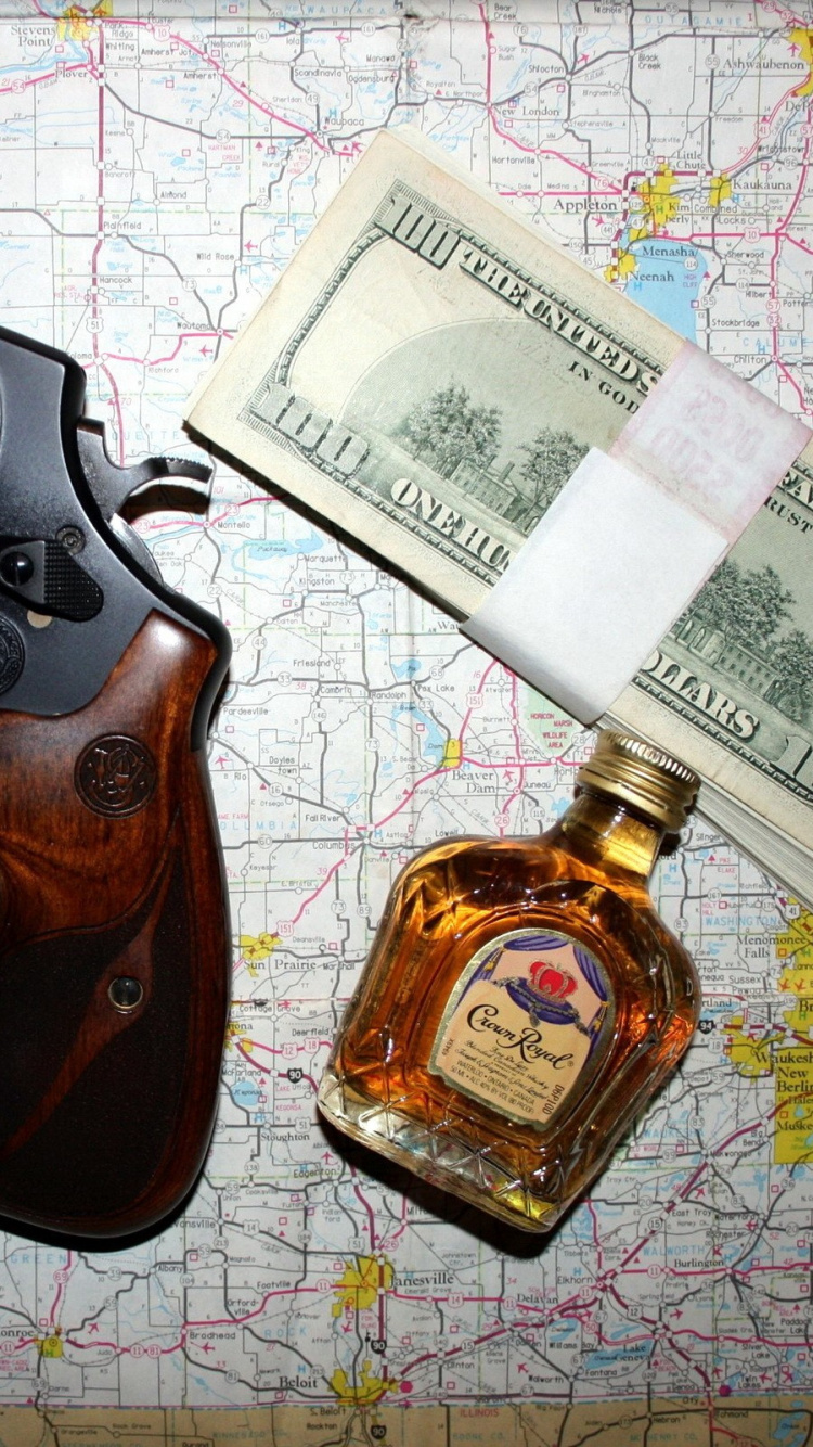 Black and Brown Revolver Pistol. Wallpaper in 750x1334 Resolution