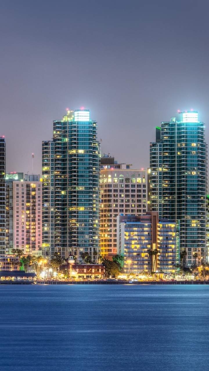 City Skyline During Night Time. Wallpaper in 720x1280 Resolution