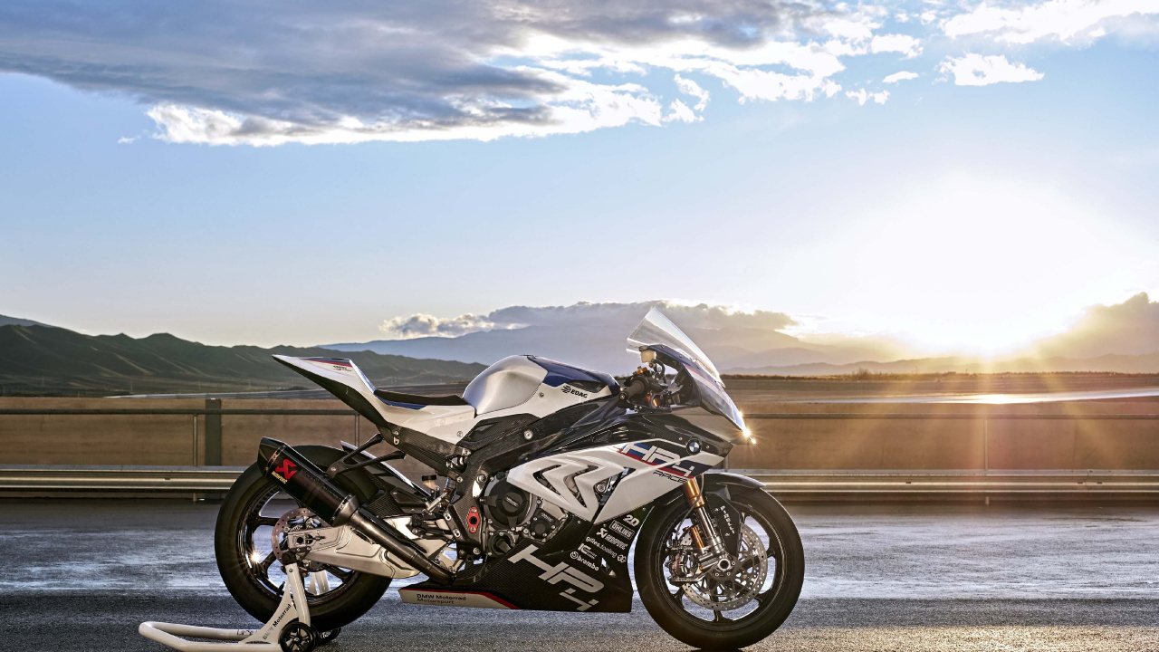 Black and Silver Sports Bike on Gray Asphalt Road During Daytime. Wallpaper in 1280x720 Resolution