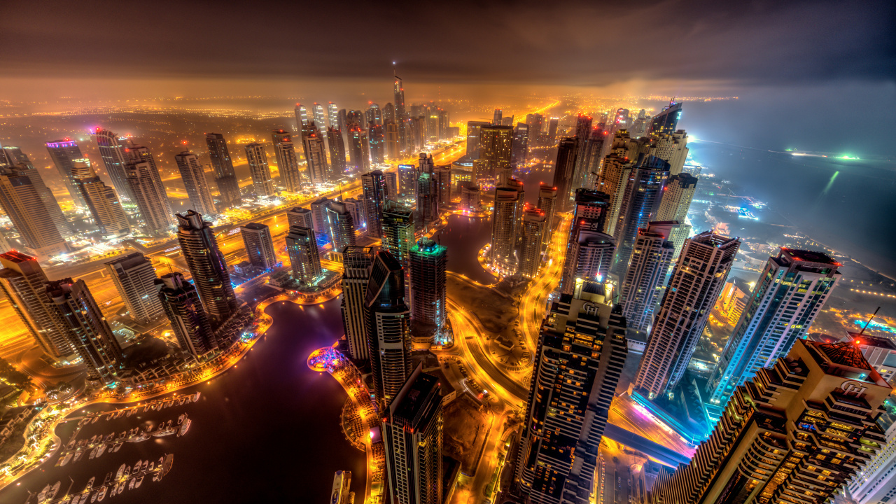 Vista Aérea de Los Edificios de la Ciudad Durante la Noche.. Wallpaper in 1280x720 Resolution