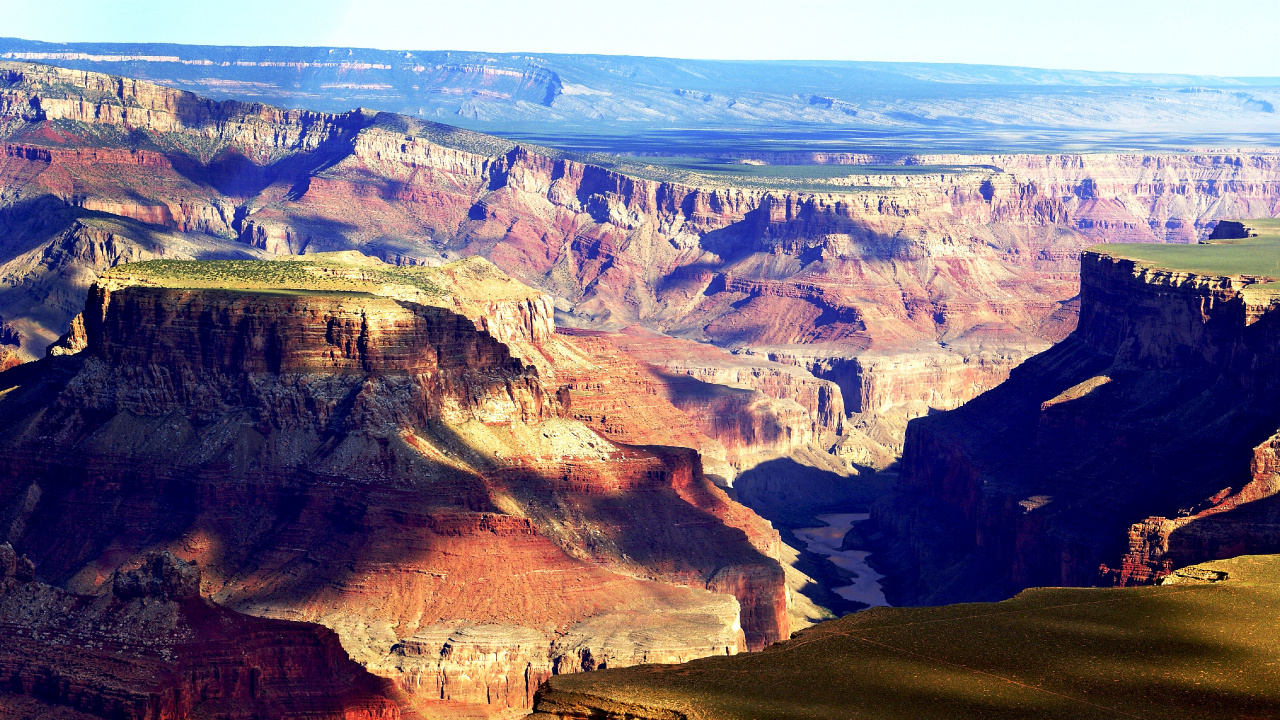 Brown Rocky Mountain Under Blue Sky During Daytime. Wallpaper in 1280x720 Resolution