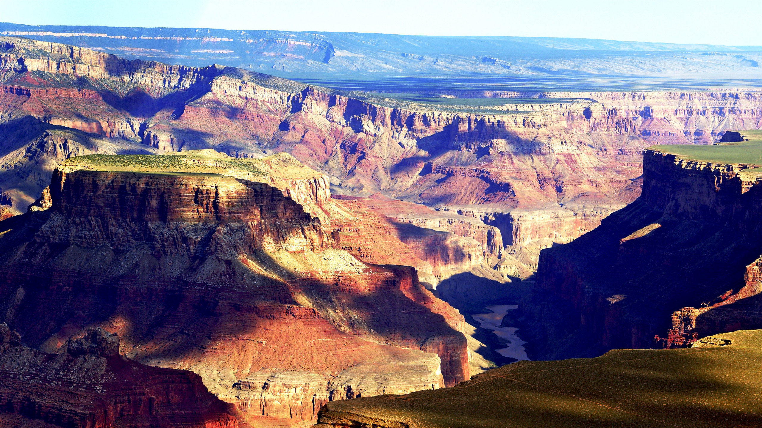 Brown Rocky Mountain Under Blue Sky During Daytime. Wallpaper in 2560x1440 Resolution