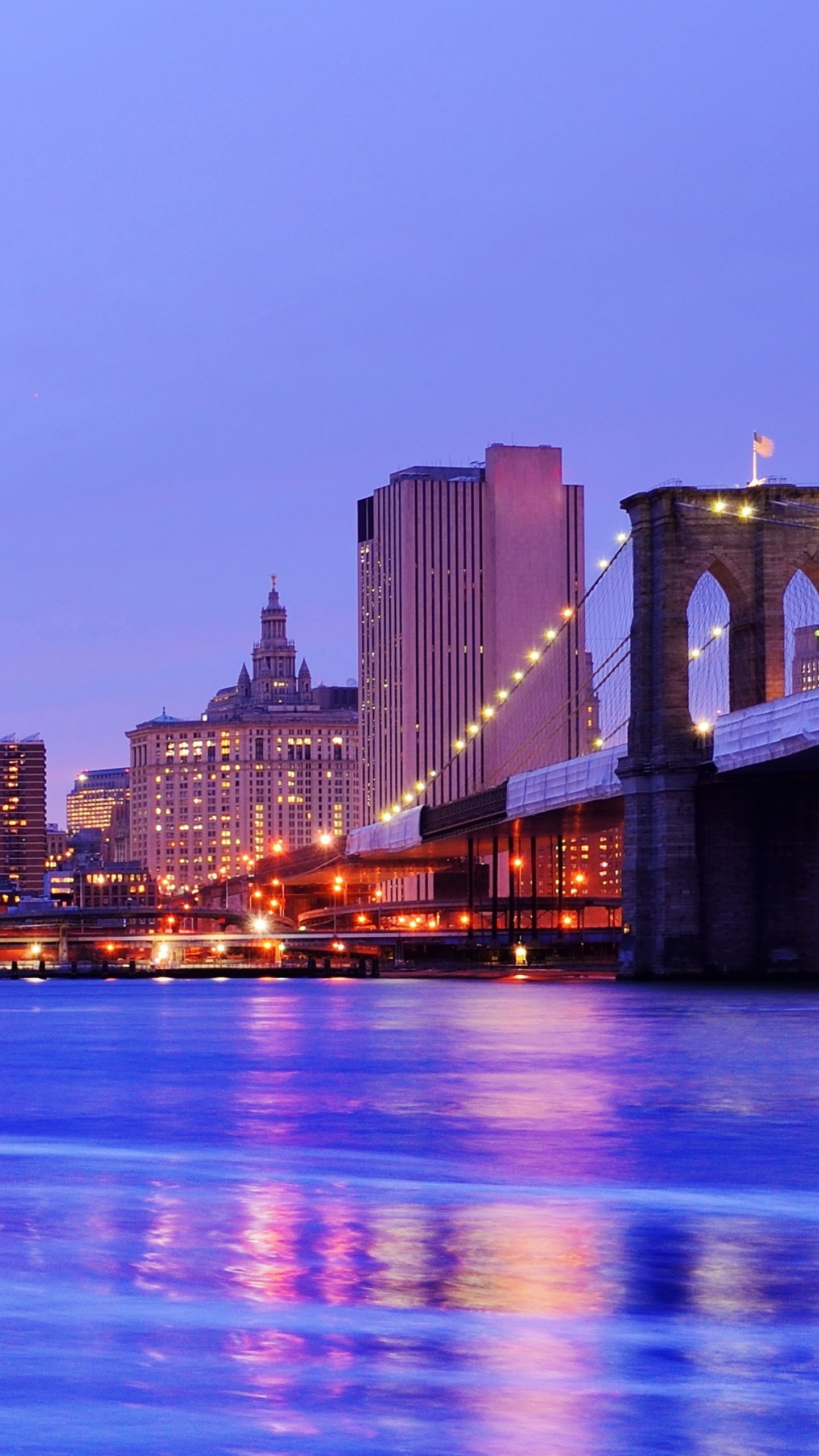 Bridge Over Water During Night Time. Wallpaper in 1440x2560 Resolution