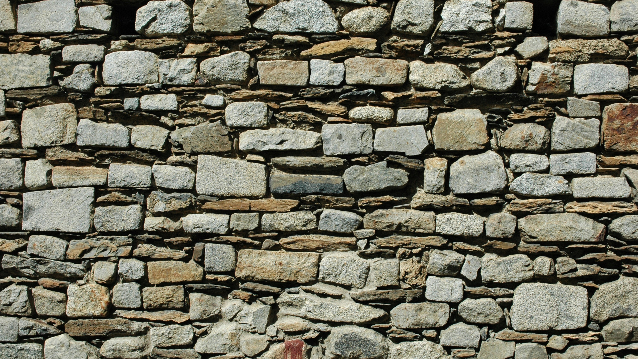 Extincteur Rouge Sur Mur de Briques Brunes. Wallpaper in 2560x1440 Resolution