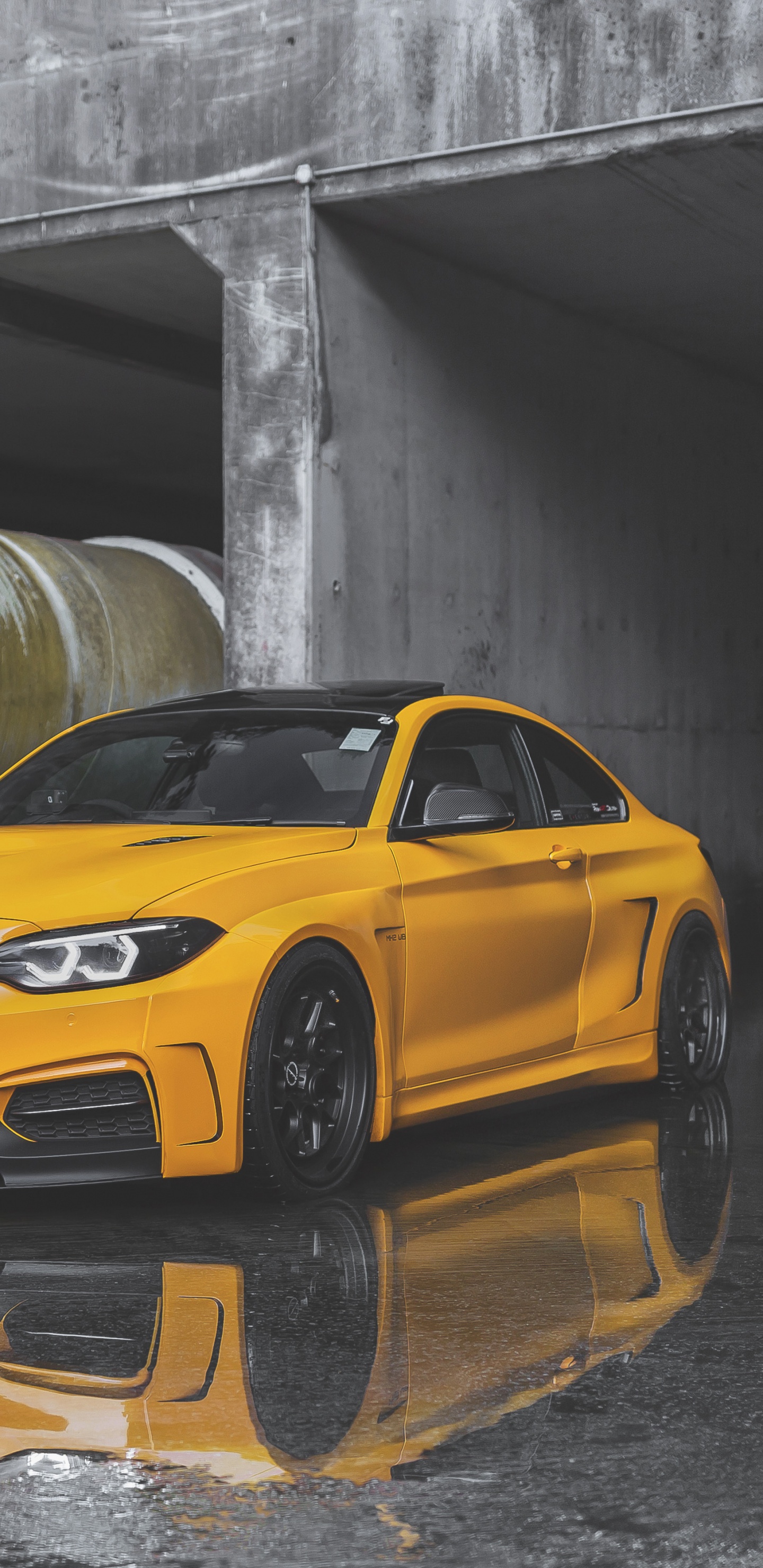 Yellow Chevrolet Camaro Parked in Garage. Wallpaper in 1440x2960 Resolution