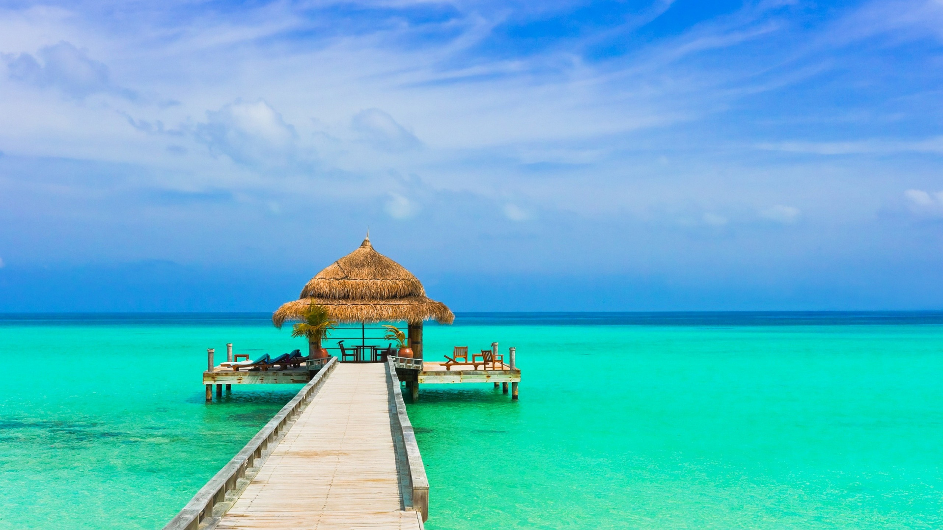 Brown Wooden Dock on Blue Sea Under Blue Sky During Daytime. Wallpaper in 1920x1080 Resolution