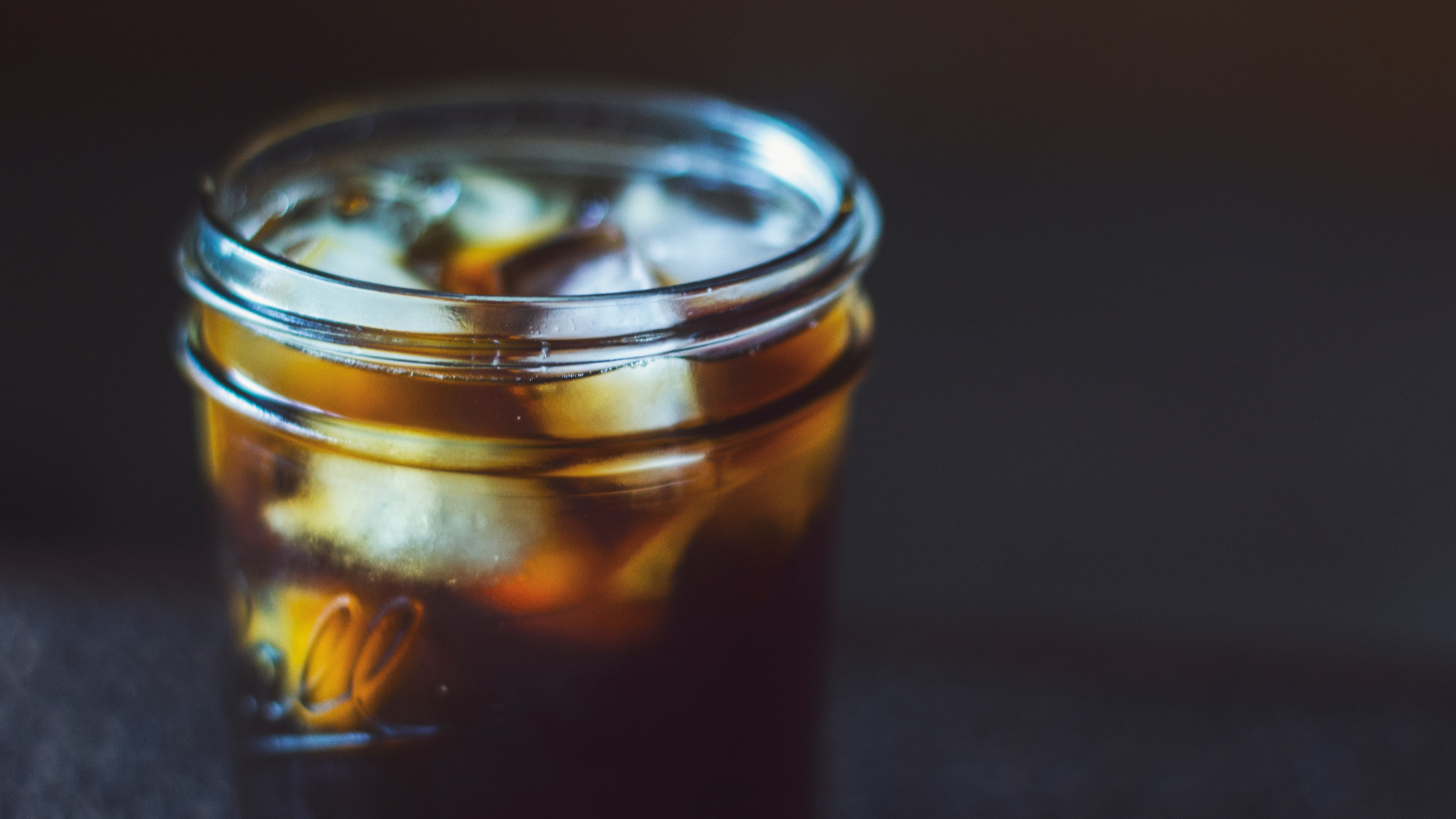 Clear Glass Jar With Yellow Liquid. Wallpaper in 1920x1080 Resolution