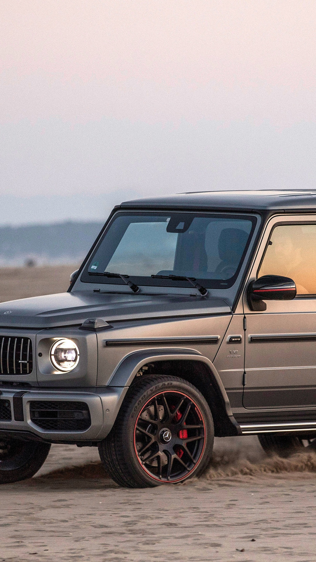Black Jeep Wrangler on Brown Sand Near Sea During Daytime. Wallpaper in 1080x1920 Resolution