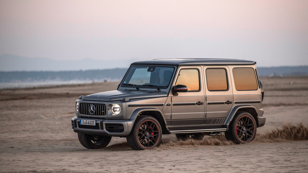 Black Jeep Wrangler on Brown Sand Near Sea During Daytime. Wallpaper in 1280x720 Resolution