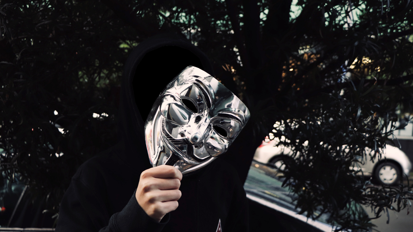 Person in Schwarzer Jacke Mit Schwarz-weißer Maske. Wallpaper in 1366x768 Resolution