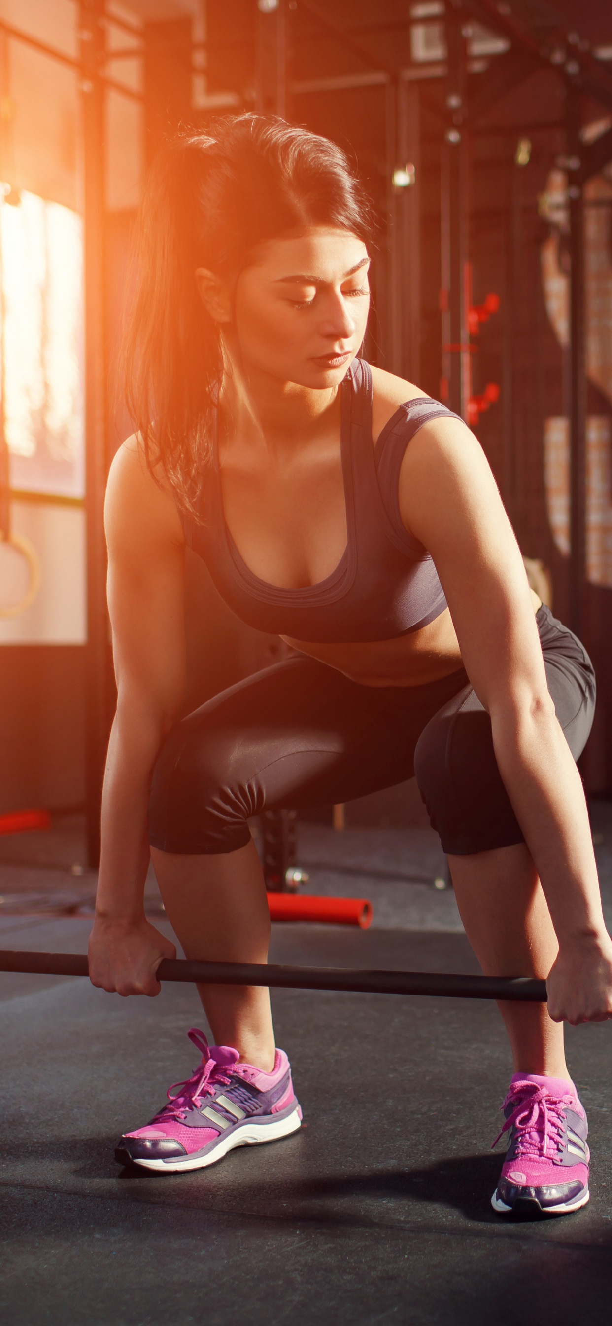 Woman in Black Tank Top and Black Leggings Doing Exercise. Wallpaper in 1242x2688 Resolution