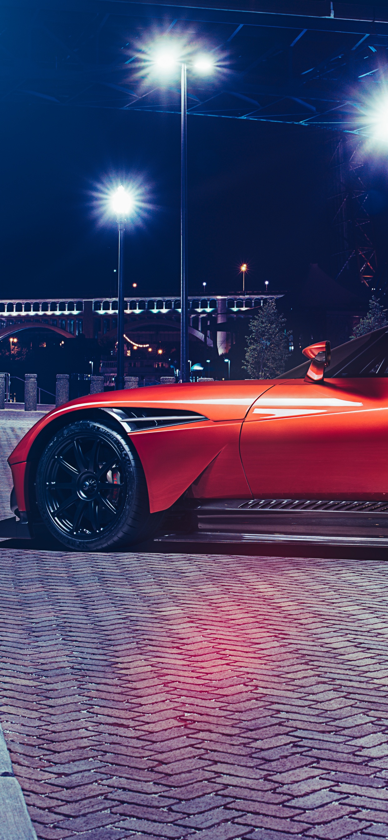 Roter Ferrari 458 Italia Auf Grauem Bürgersteig Geparkt. Wallpaper in 1242x2688 Resolution