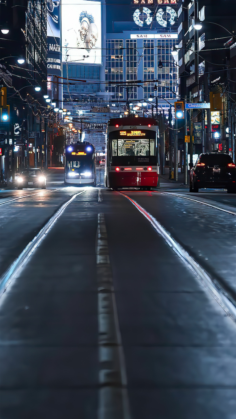 Mixed Use, Bus, Luxury Car, Tram, Building. Wallpaper in 750x1334 Resolution