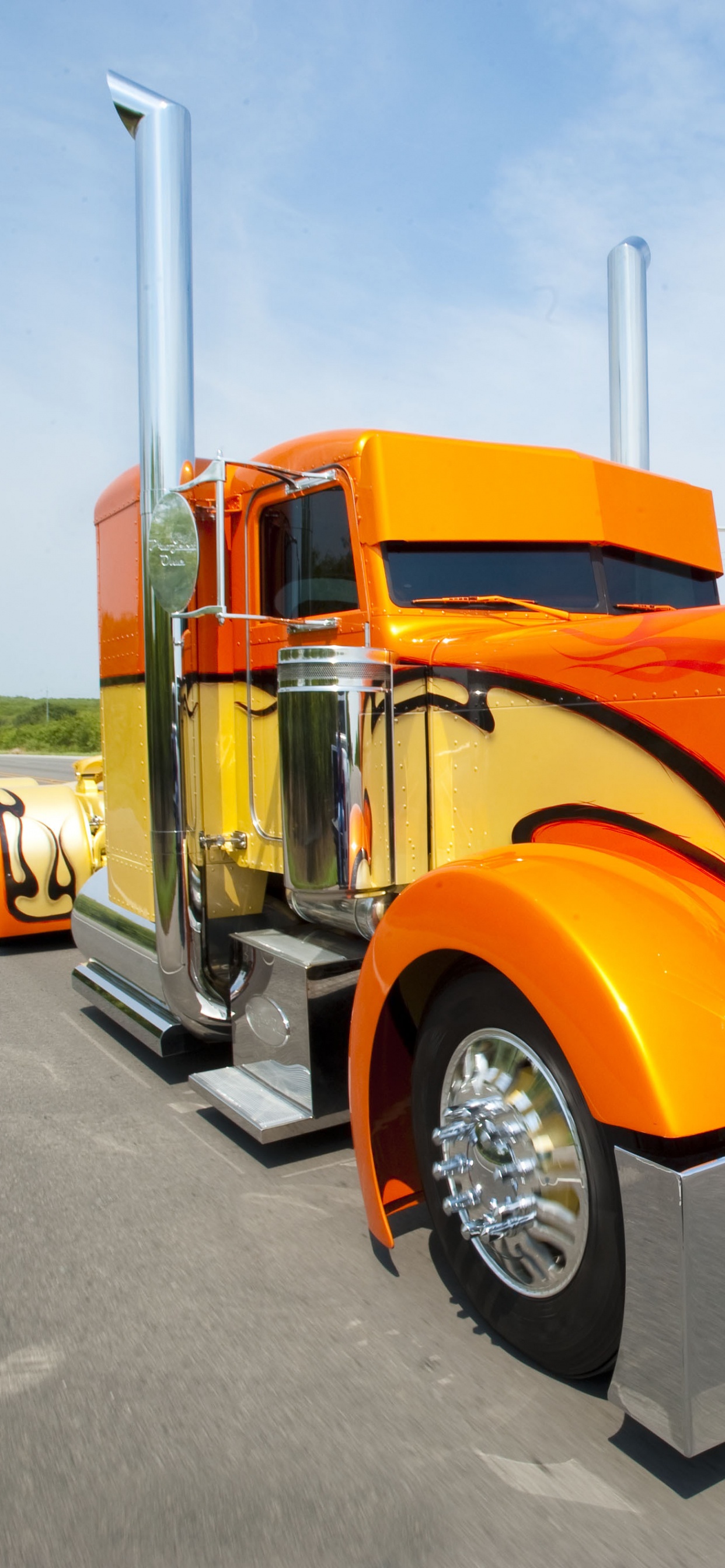 Orange Truck on Road During Daytime. Wallpaper in 1242x2688 Resolution