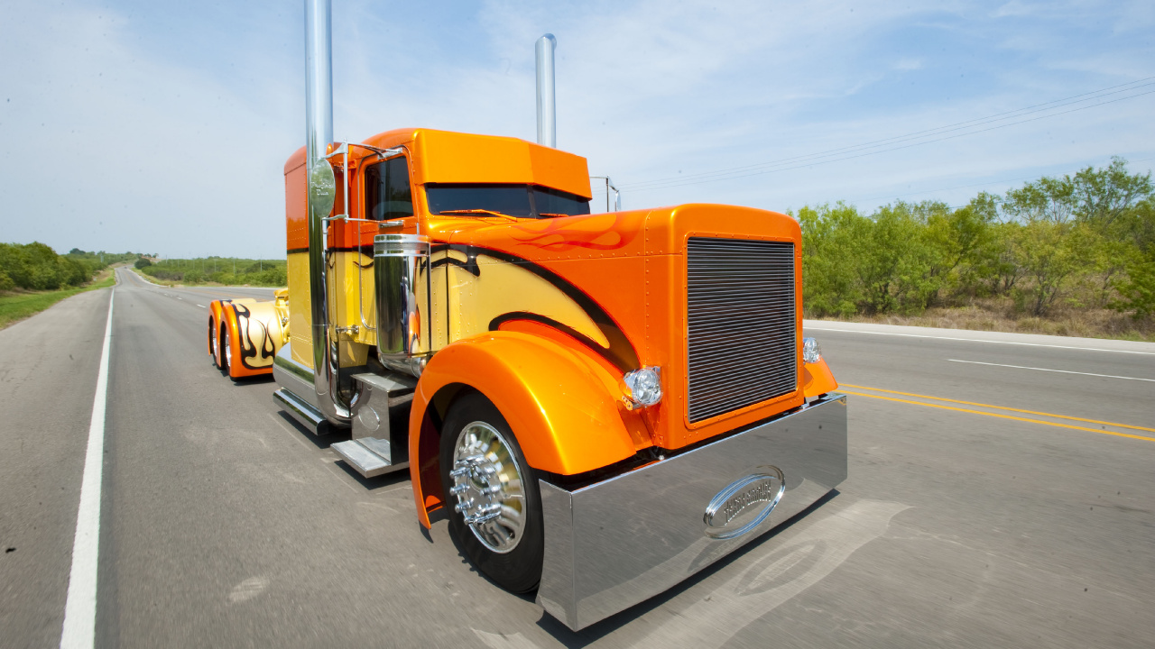 Orange Truck on Road During Daytime. Wallpaper in 1280x720 Resolution
