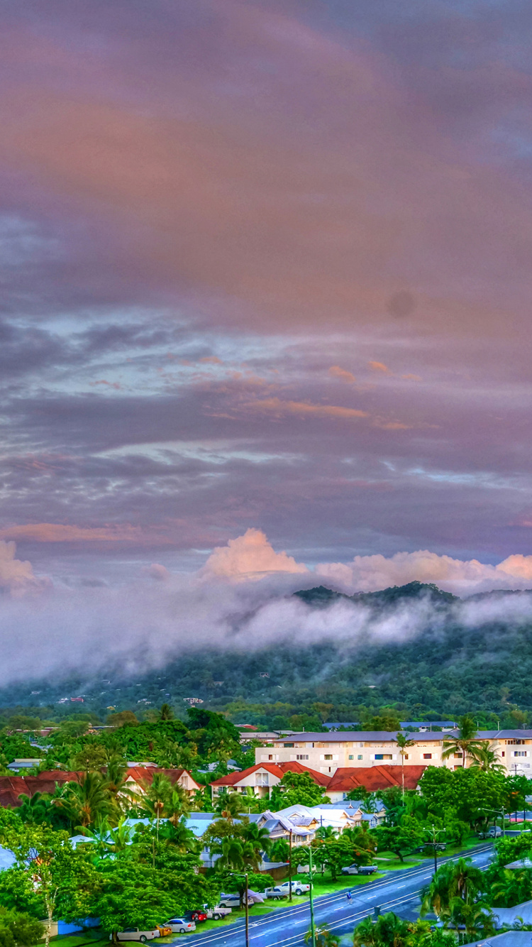 White and Brown Houses Under Cloudy Sky During Daytime. Wallpaper in 750x1334 Resolution