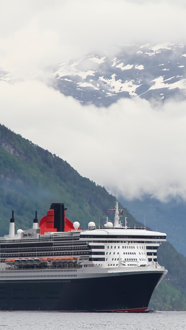 White and Blue Ship on Water Near Mountain During Daytime. Wallpaper in 720x1280 Resolution