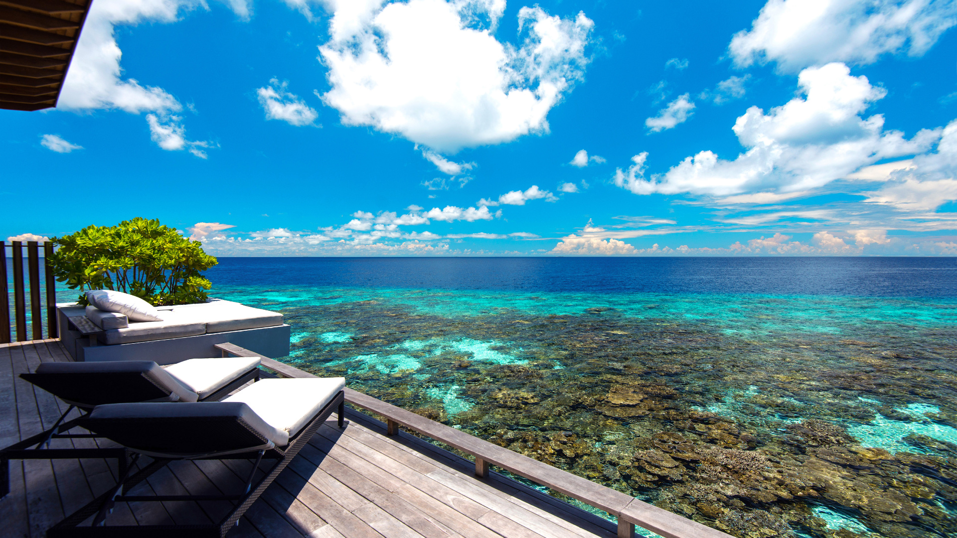 Brown Wooden Dock on Blue Sea Under Blue Sky During Daytime. Wallpaper in 1920x1080 Resolution