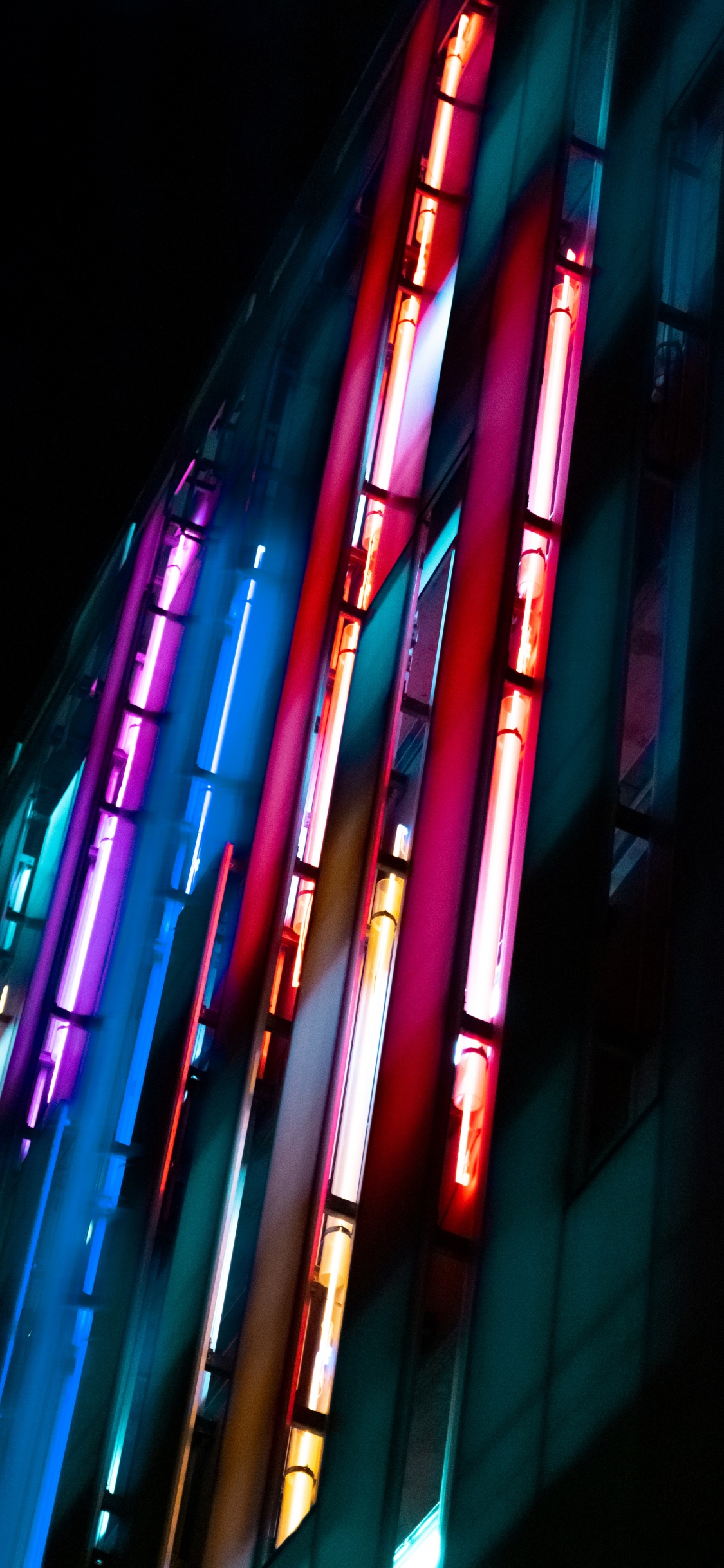 Luces Azules Rojas y Amarillas. Wallpaper in 1125x2436 Resolution