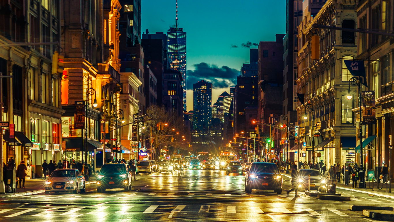 Cars on Road Between High Rise Buildings During Night Time. Wallpaper in 1366x768 Resolution
