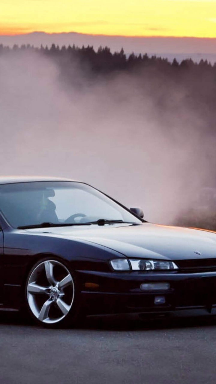 Mercedes Benz Coupé Noir Sur Route. Wallpaper in 720x1280 Resolution