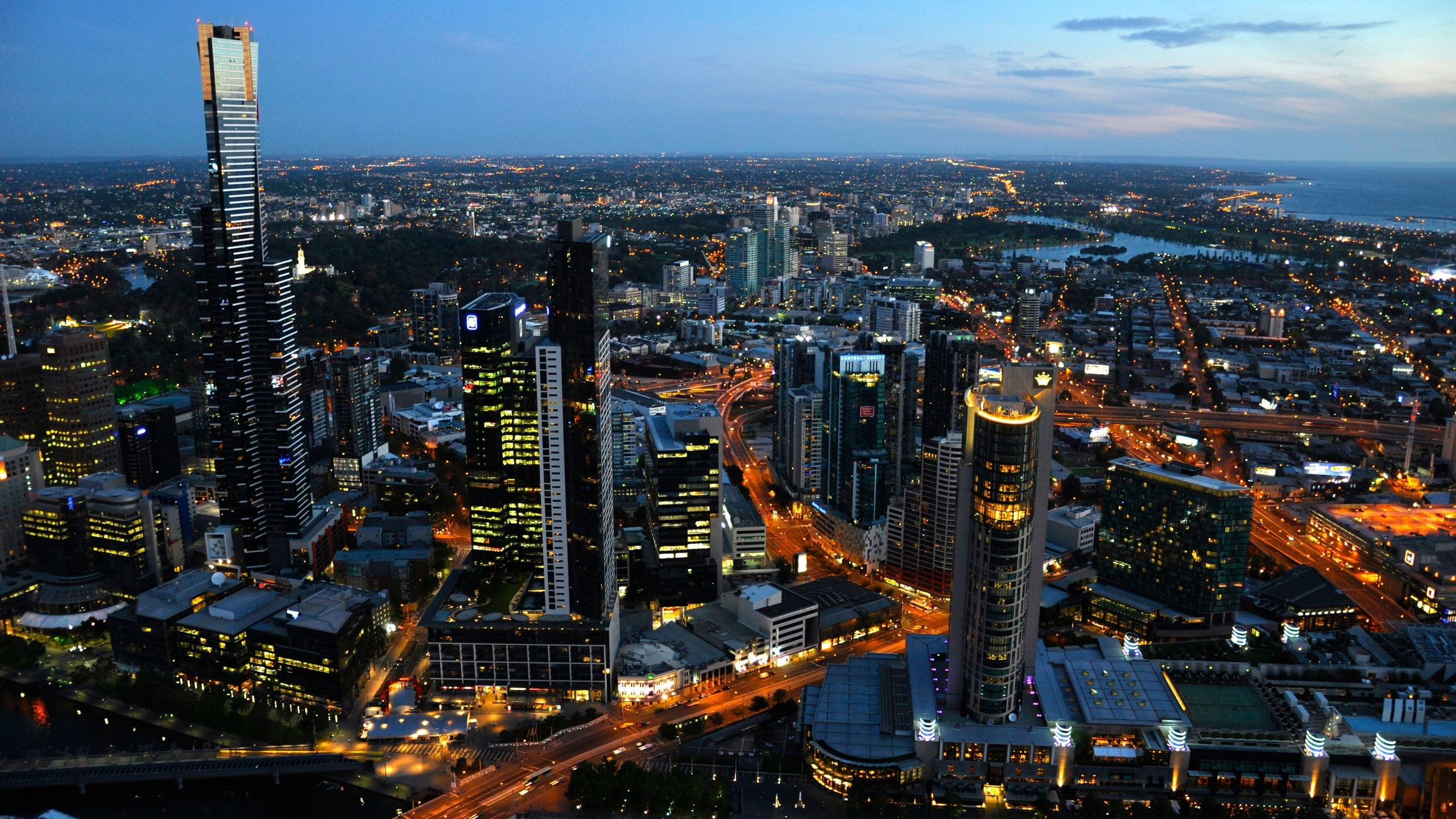 Aerial View of City Buildings During Night Time. Wallpaper in 2560x1440 Resolution
