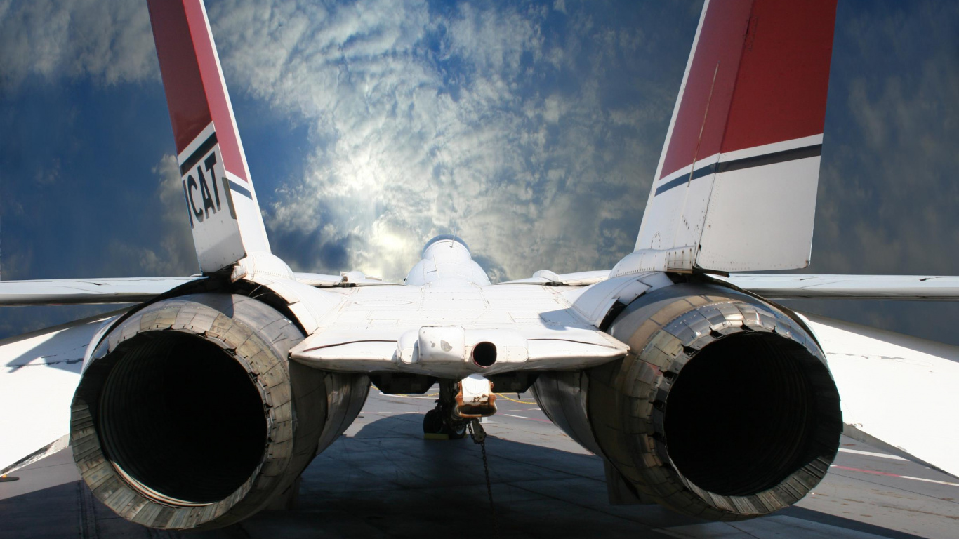 White and Red Airplane Under Blue Sky During Daytime. Wallpaper in 1366x768 Resolution
