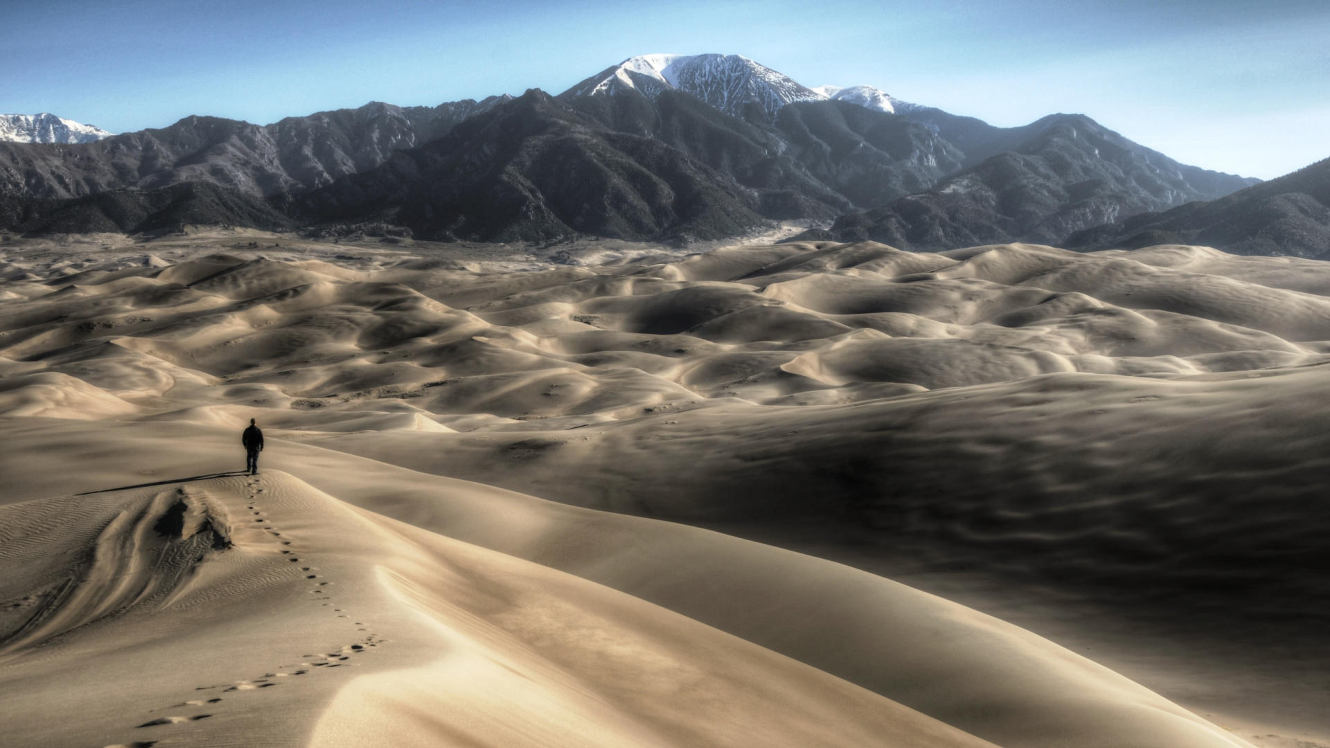 Brown Sand With Snow Covered Mountain in Distance. Wallpaper in 1920x1080 Resolution