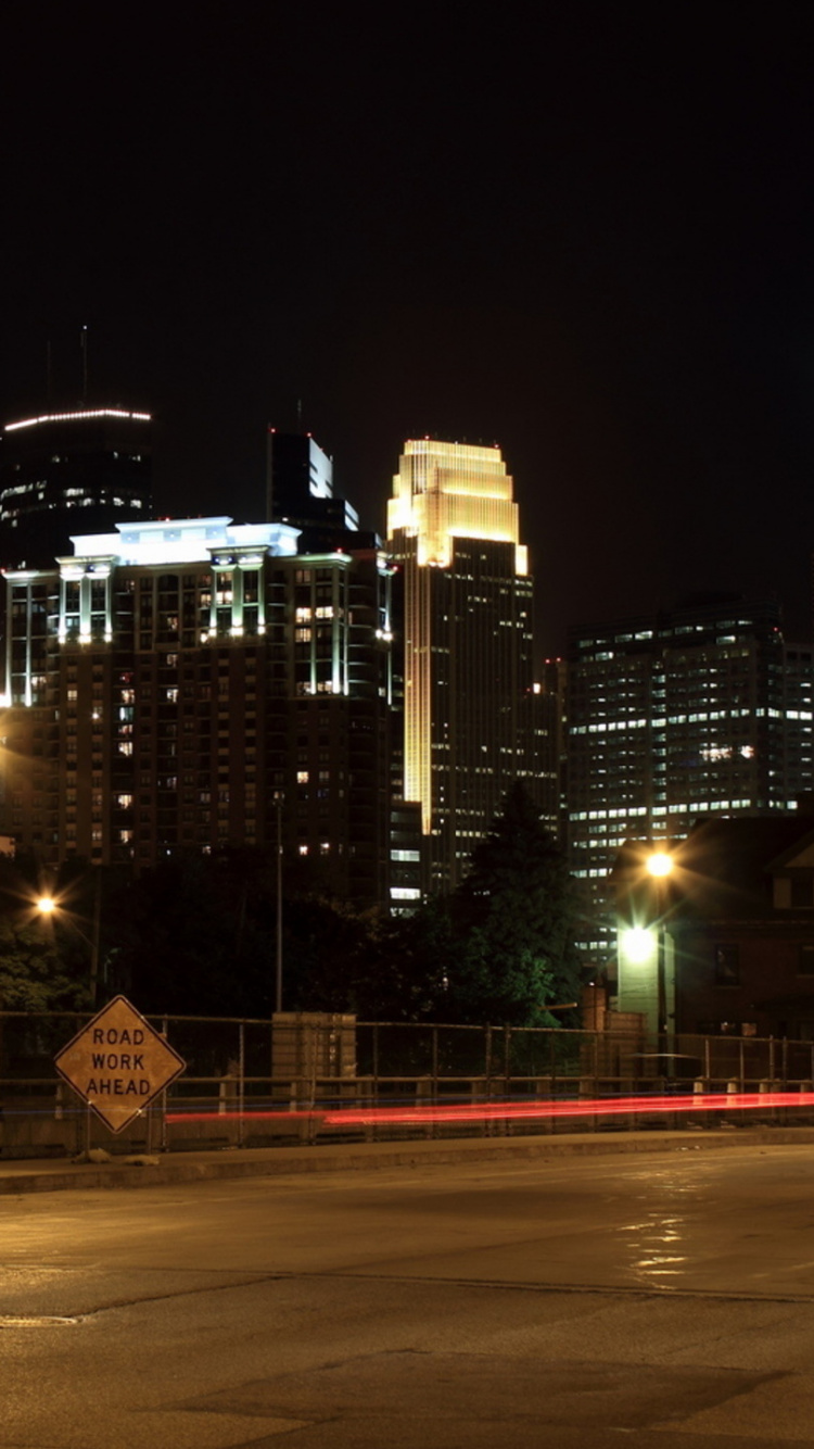 City Buildings During Night Time. Wallpaper in 750x1334 Resolution